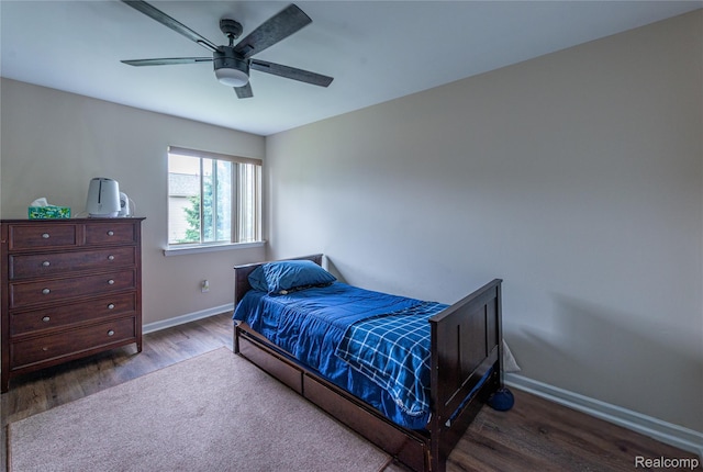 24511 Pinehurst Ave Unit 14, Oak Park, MI 48237 - bedroom with wood finished floors, baseboards, and a ceiling fan