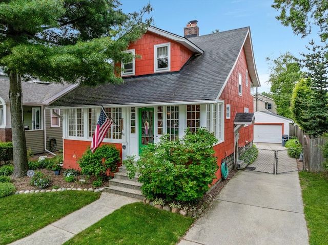 708 S Laurel St, Royal Oak, MI 48067 - view of front of house featuring a shingled roof, a detached garage, a chimney, a gate, and an outdoor structure