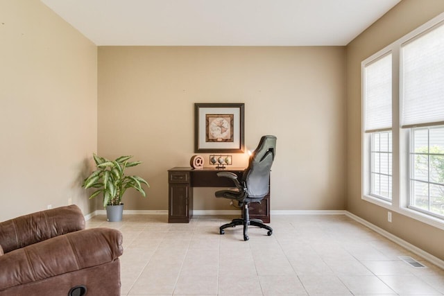 3352 Hampstead Ct, Portage, MI 49024 - office area featuring light tile patterned floors and baseboards