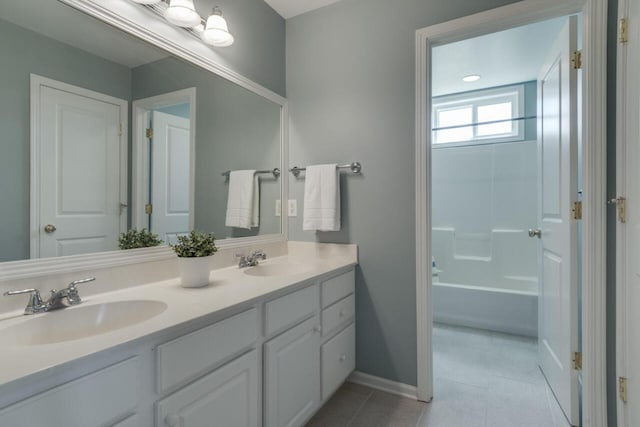 3352 Hampstead Ct, Portage, MI 49024 - bathroom with double vanity and baseboards