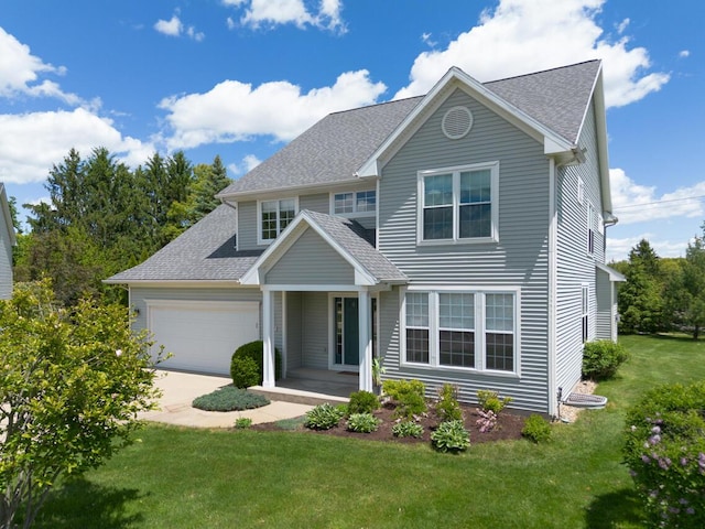 3352 Hampstead Ct, Portage, MI 49024 - traditional-style house with driveway, an attached garage, a front yard, and roof with shingles