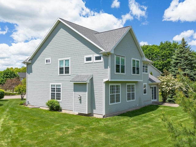 3352 Hampstead Ct, Portage, MI 49024 - back of property featuring a yard and roof with shingles