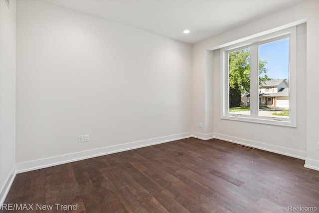 2911 Walsh Dr, Rochester Hills, MI 48309 - unfurnished room featuring dark wood-type flooring, baseboards, and recessed lighting