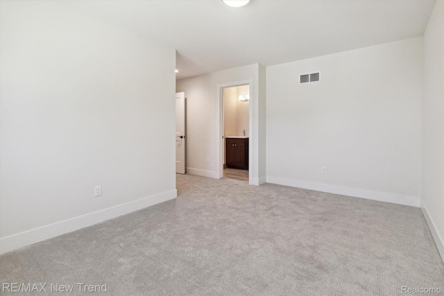 2911 Walsh Dr, Rochester Hills, MI 48309 - empty room featuring baseboards and light carpet