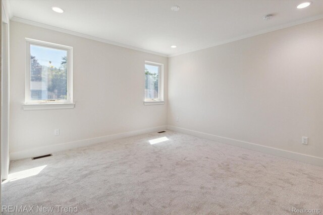 2911 Walsh Dr, Rochester Hills, MI 48309 - unfurnished room featuring crown molding, baseboards, carpet floors, recessed lighting, and a smoke detector