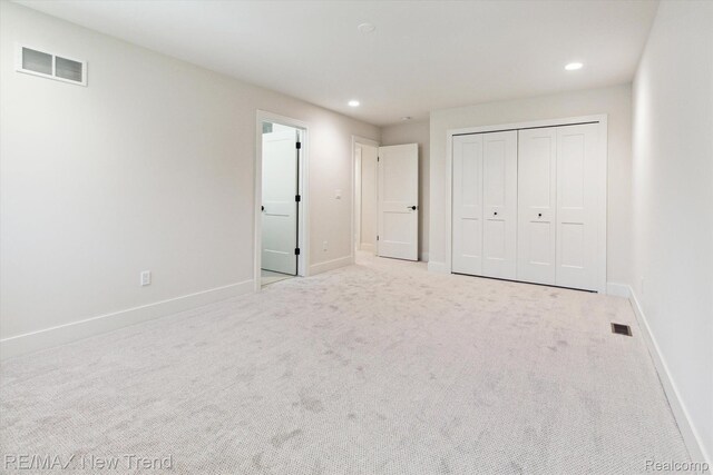 2911 Walsh Dr, Rochester Hills, MI 48309 - unfurnished bedroom featuring recessed lighting, carpet floors, baseboards, and a closet