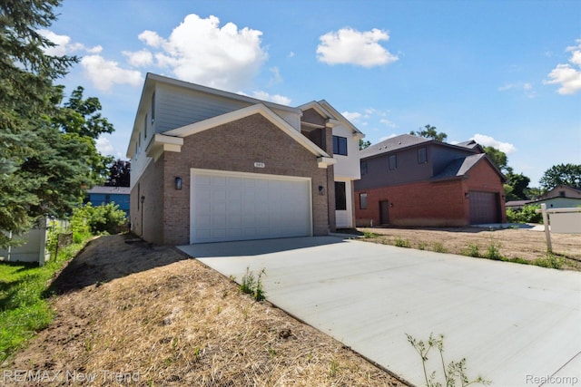 2911 Walsh Dr, Rochester Hills, MI 48309 - traditional home featuring brick siding, driveway, and an attached garage