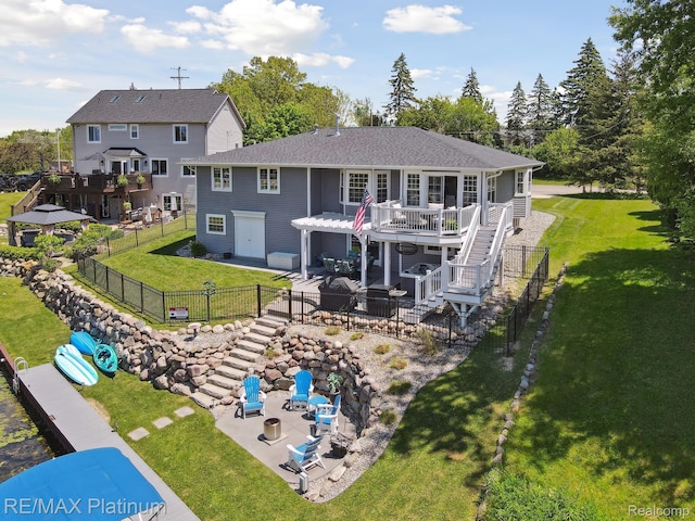 13368 Fenton Rd, Fenton, MI 48430 - rear view of property with a patio area, stairway, a wooden deck, and a shingled roof