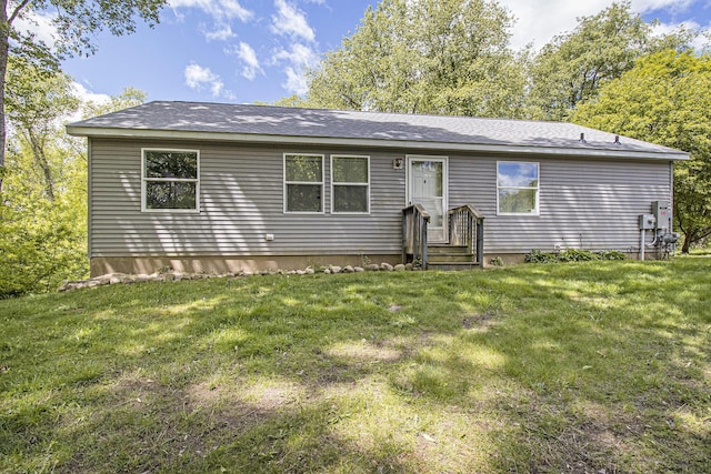 7929 N 48th St, Augusta, MI 49012 - ranch-style home with a front yard and a shingled roof