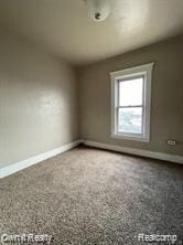 41 Maple St, River Rouge, MI 48218 - spare room with baseboards