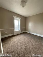 41 Maple St, River Rouge, MI 48218 - carpeted spare room with baseboards
