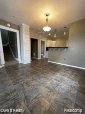 41 Maple St, River Rouge, MI 48218 - unfurnished living room featuring baseboards