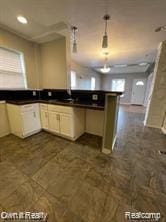 41 Maple St, River Rouge, MI 48218 - kitchen with dark countertops and pendant lighting