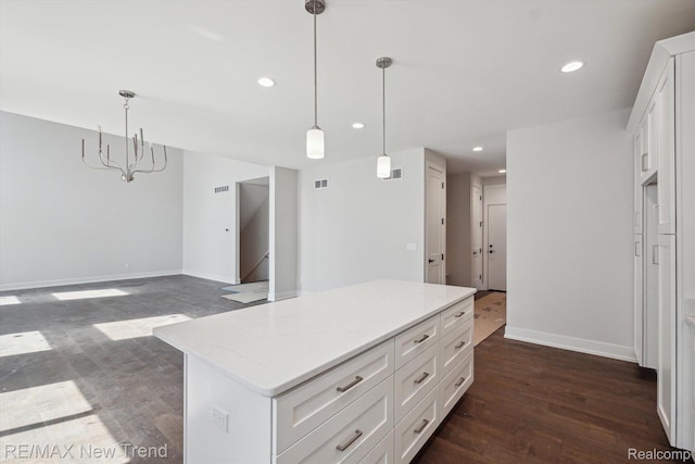 2921 Walsh Dr, Rochester Hills, MI 48309 - kitchen featuring a chandelier, white cabinets, baseboards, recessed lighting, and a kitchen island