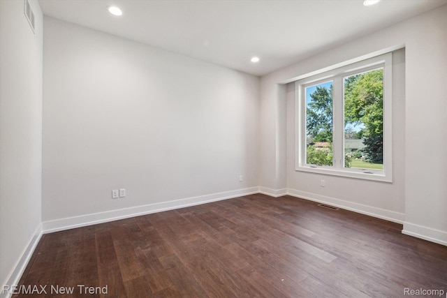 2921 Walsh Dr, Rochester Hills, MI 48309 - unfurnished room featuring dark wood-style floors, baseboards, and recessed lighting