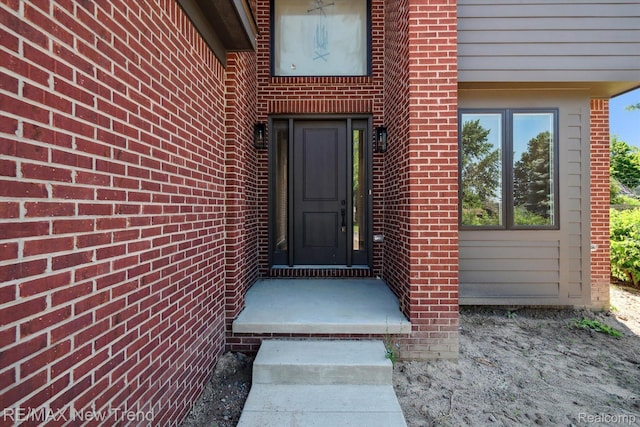 2921 Walsh Dr, Rochester Hills, MI 48309 - view of exterior entry with brick siding
