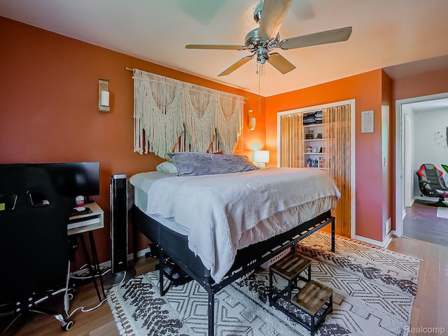 1468 Ruby Ave, Rochester Hills, MI 48309 - bedroom featuring wood finished floors, baseboards, a closet, and a ceiling fan