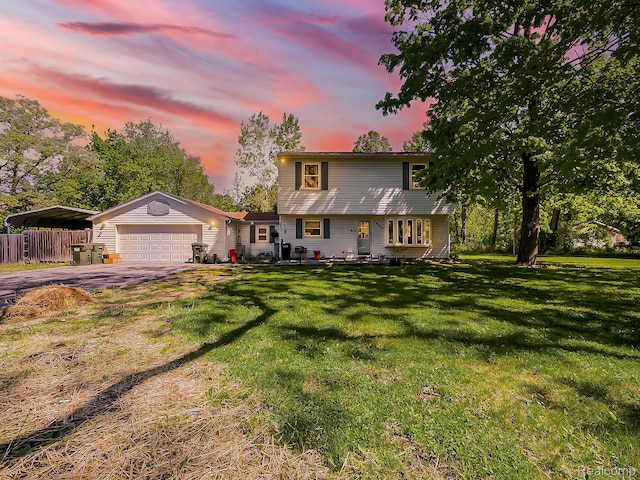 1468 Ruby Ave, Rochester Hills, MI 48309 - colonial home featuring an attached garage, asphalt driveway, and a carport