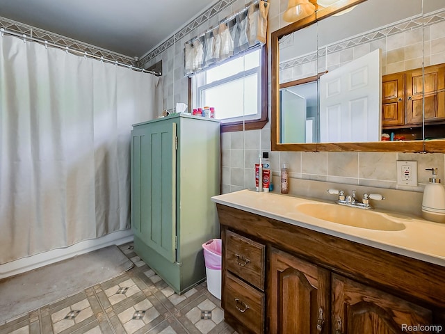 1468 Ruby Ave, Rochester Hills, MI 48309 - bathroom with tile walls, vanity, a shower with curtain, tasteful backsplash, and tile patterned floors