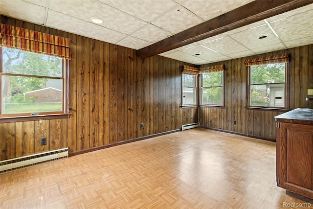 13128 Talbot Ave, Huntington Woods, MI 48070 - empty room with a baseboard radiator, wooden walls, a baseboard heating unit, baseboards, and parquet floors