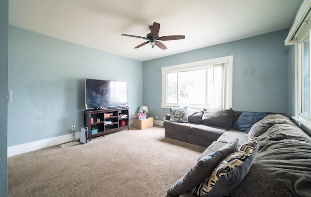 13 Rena St SW, Grand Rapids, MI 49507 - living room featuring carpet flooring, ceiling fan, and baseboards