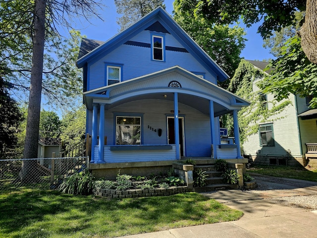 1114 E Michigan Ave, Albion, MI 49224 - victorian-style house featuring a porch