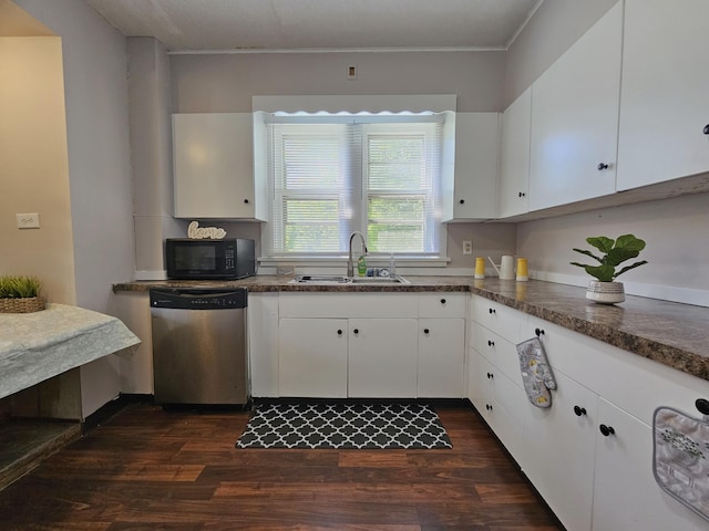 1114 E Michigan Ave, Albion, MI 49224 - kitchen featuring a sink, dishwasher, black microwave, dark wood-style flooring, and white cabinets