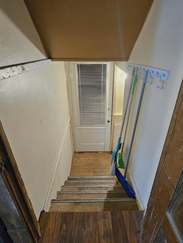 1114 E Michigan Ave, Albion, MI 49224 - stairs featuring wood finished floors