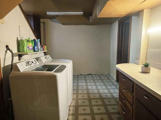1114 E Michigan Ave, Albion, MI 49224 - laundry area featuring light floors and washing machine and clothes dryer