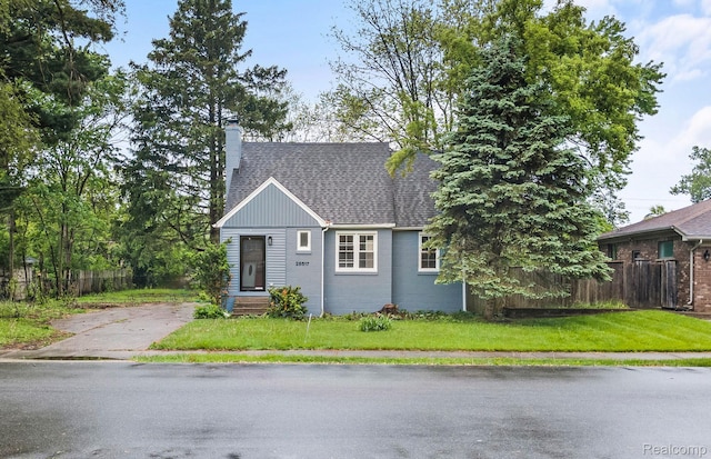 28517 Aberdeen St, Southfield, MI 48076 - view of front facade with a chimney and roof with shingles