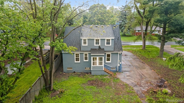 28517 Aberdeen St, Southfield, MI 48076 - view of front of house with a shingled roof, asphalt driveway, and entry steps