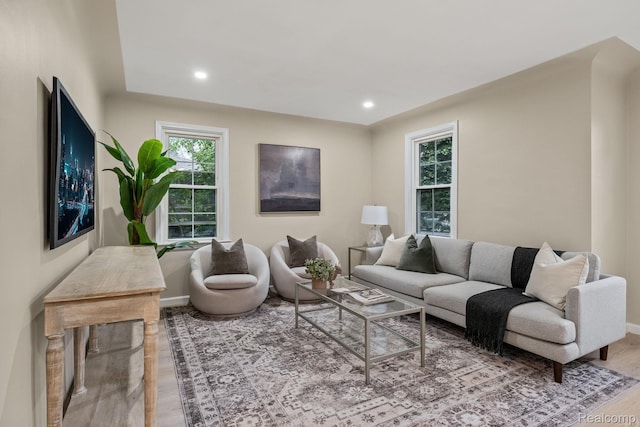 28517 Aberdeen St, Southfield, MI 48076 - living area with healthy amount of natural light, wood finished floors, baseboards, and recessed lighting