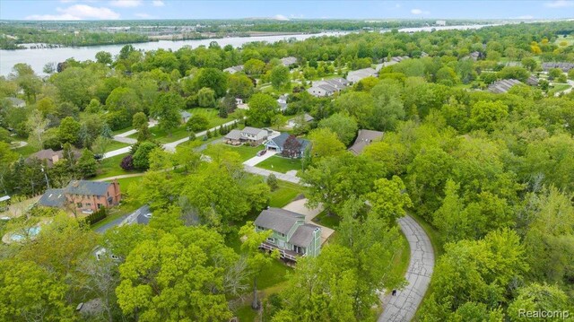 10161 N Loma Cir, Grosse Ile, MI 48138 - aerial view of residential area featuring a large body of water