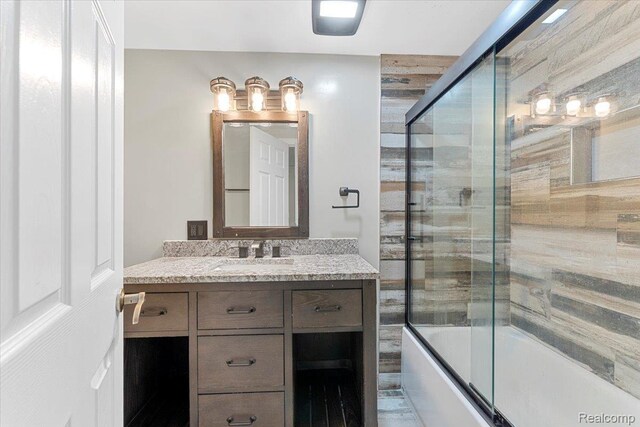 10161 N Loma Cir, Grosse Ile, MI 48138 - full bathroom with vanity and enclosed tub / shower combo