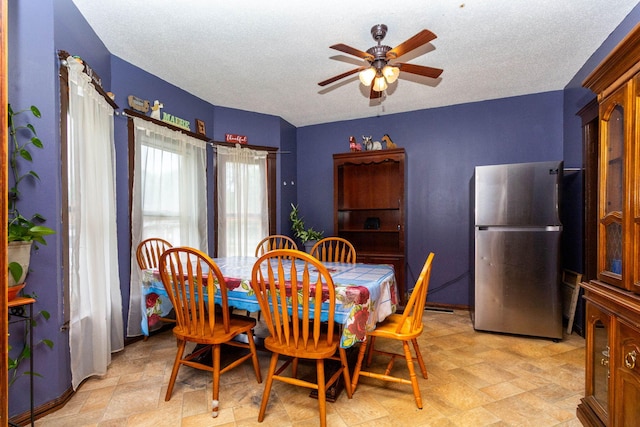 323 Northbound Gratiot Ave, Mount Clemens, MI 48043 - dining area with a ceiling fan, stone finish floors, and a textured ceiling
