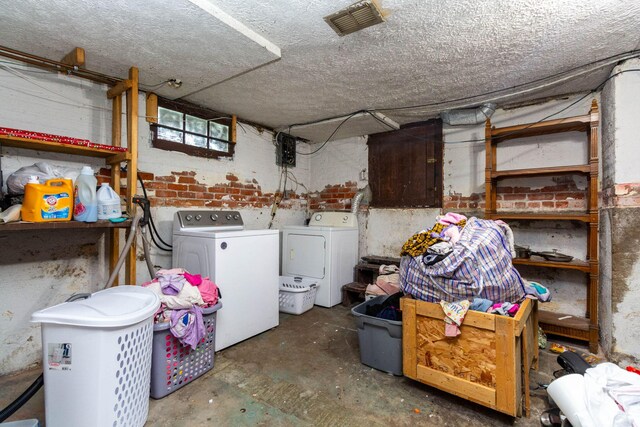 323 Northbound Gratiot Ave, Mount Clemens, MI 48043 - below grade area with washer and dryer and a textured ceiling