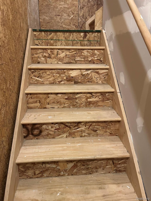 23971 Manistee Ln, Flat Rock, MI 48134 - staircase with wood finished floors and a sauna / steam room