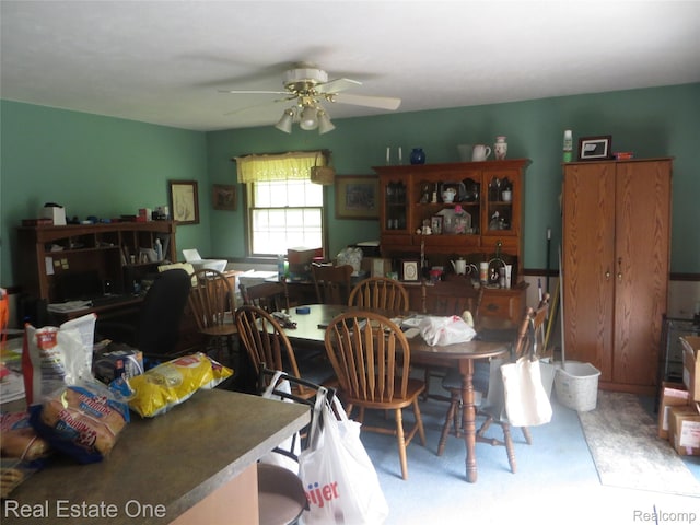 4072 M 55, Cadillac, MI 49601 - dining area with a ceiling fan