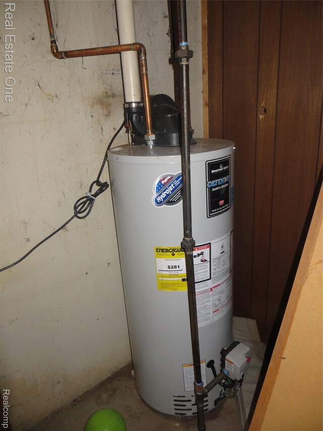 4072 M 55, Cadillac, MI 49601 - utility room with water heater