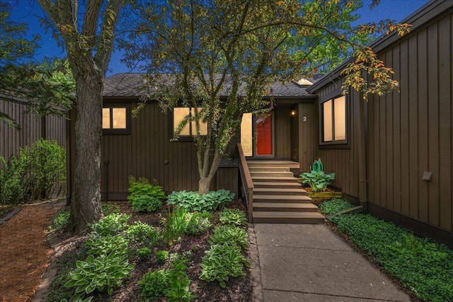 2 Eastbury Ct, Ann Arbor, MI 48105 - doorway to property with a shingled roof