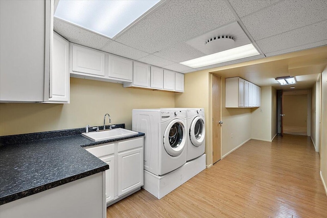 2 Eastbury Ct, Ann Arbor, MI 48105 - washroom featuring washing machine and clothes dryer and light wood-style flooring