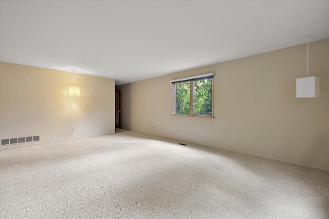 2 Eastbury Ct, Ann Arbor, MI 48105 - carpeted spare room with baseboards