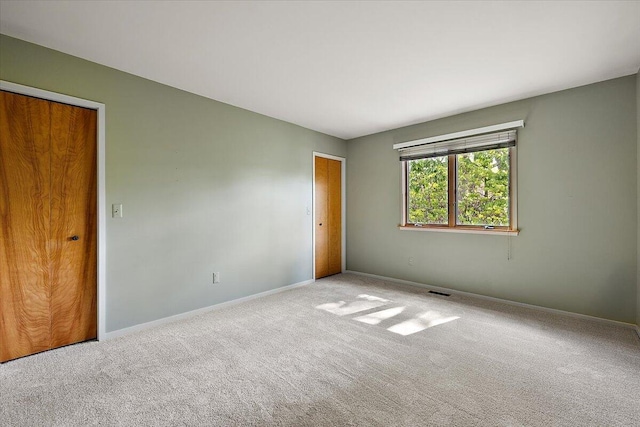 2 Eastbury Ct, Ann Arbor, MI 48105 - unfurnished room with carpet floors and baseboards