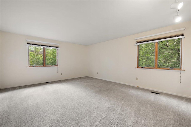 2 Eastbury Ct, Ann Arbor, MI 48105 - carpeted spare room with baseboards
