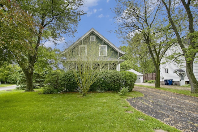 3209 Springbrook St, Ann Arbor, MI 48108 - view of front of home featuring a front yard and a garage