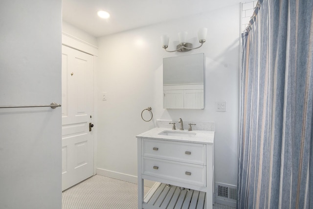 3209 Springbrook St, Ann Arbor, MI 48108 - full bath featuring vanity, tile patterned flooring, and baseboards