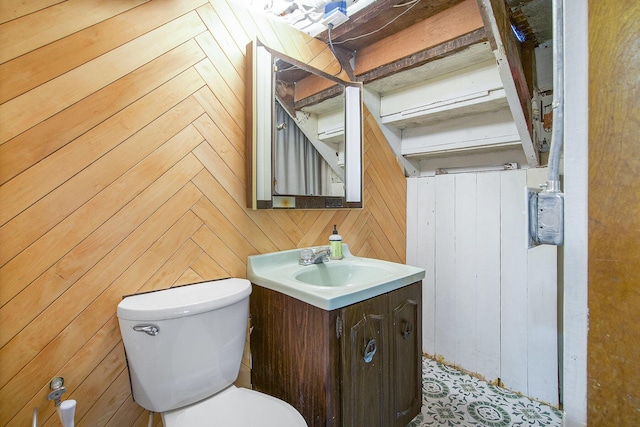 3209 Springbrook St, Ann Arbor, MI 48108 - half bathroom with vanity, toilet, and wooden walls