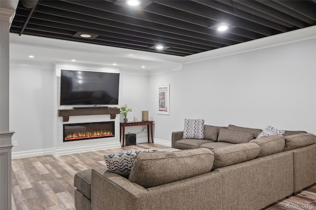 22638 Brantingham Rd, Macomb, MI 48044 - living area featuring ornamental molding, light wood-type flooring, baseboards, a fireplace, and recessed lighting