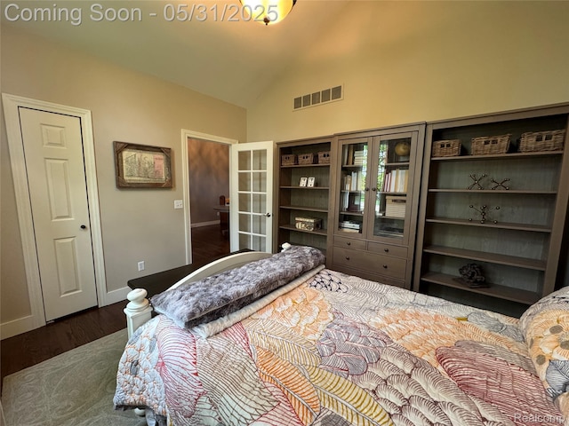 7348 William Dr, Shelby Twp, MI 48316 - bedroom featuring dark wood-style flooring, baseboards, and vaulted ceiling