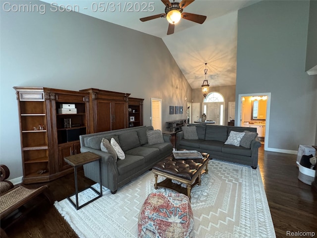 7348 William Dr, Shelby Twp, MI 48316 - living area with high vaulted ceiling, a ceiling fan, baseboards, and wood finished floors